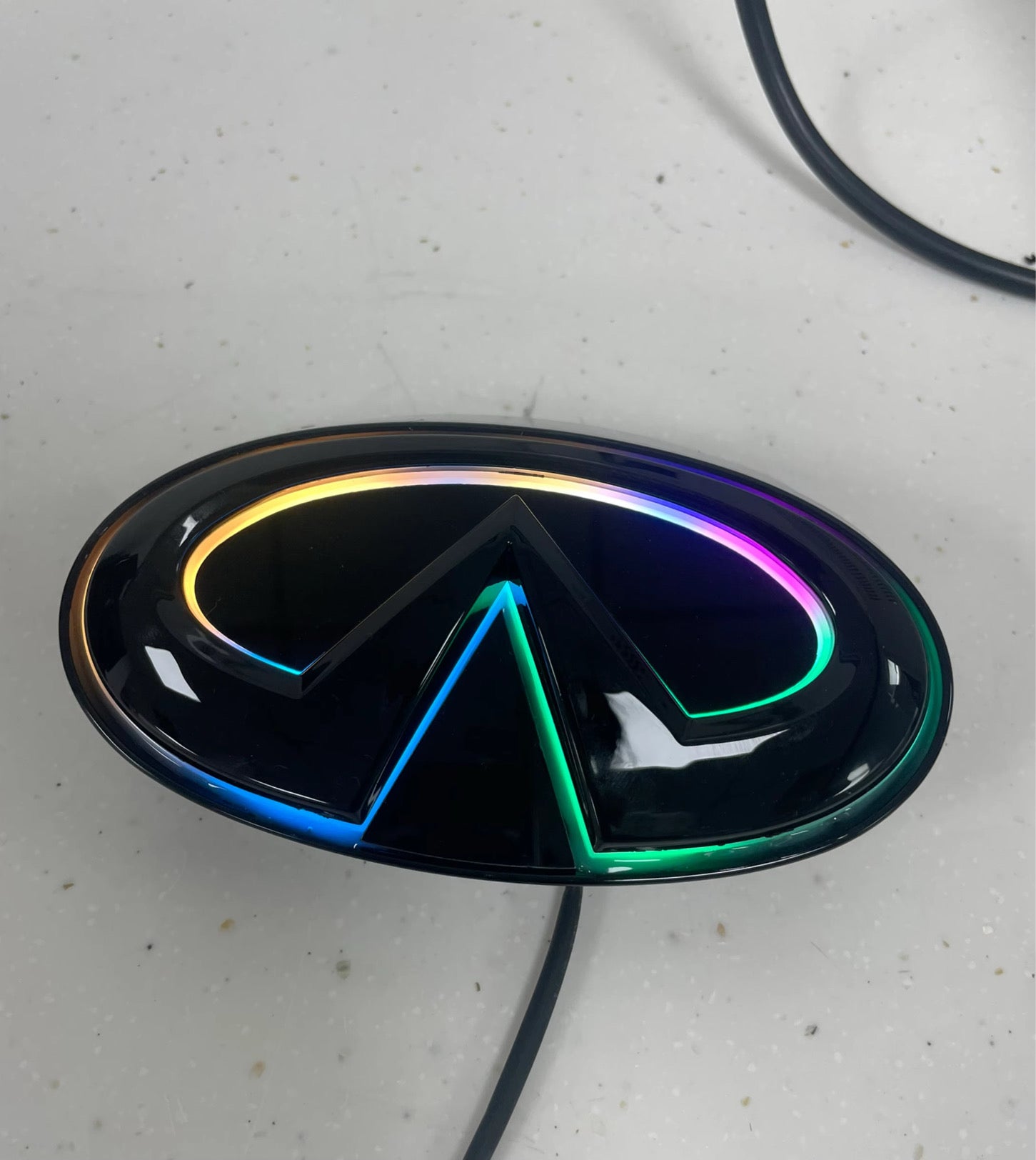 MyVQParts V2 Flow RGB LED Emblem – G37, Q50, Q60 (2008–2023) | Chrome, Gloss Black, Carbon